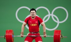 万博官网:男子举重全锦赛收官 全运会“四冠王”杨哲夺两金